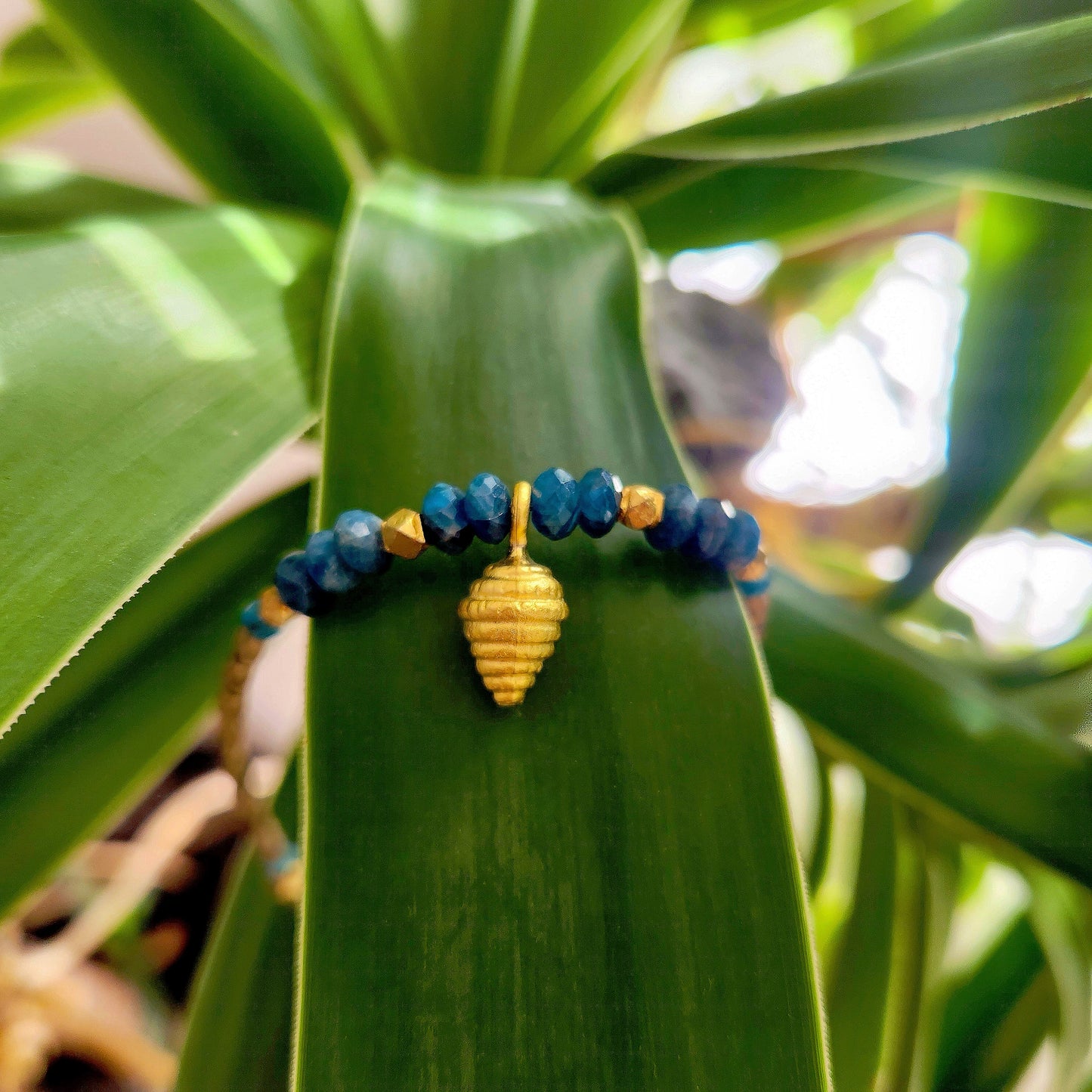 Faceted Apatite Gold Overlay Shell Bracelet